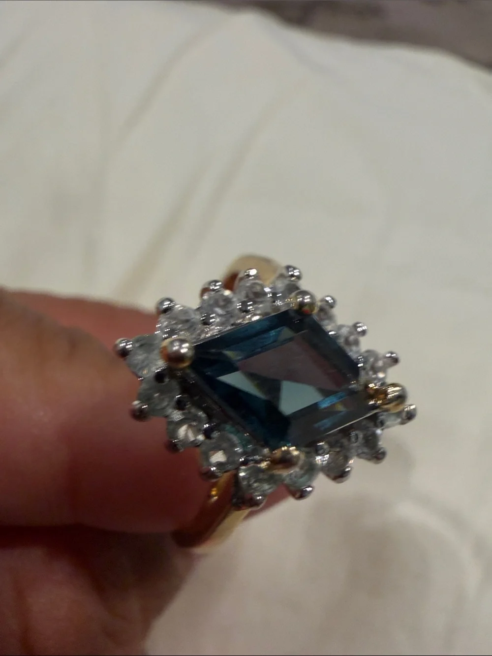 18K Gold Electroplated Ring with Deep Blue Kite-Cut Center and Clear Stones.